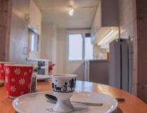 table, indoor, tableware, coffee cup, wall, saucer, plate, furniture, mug, bowl, vase